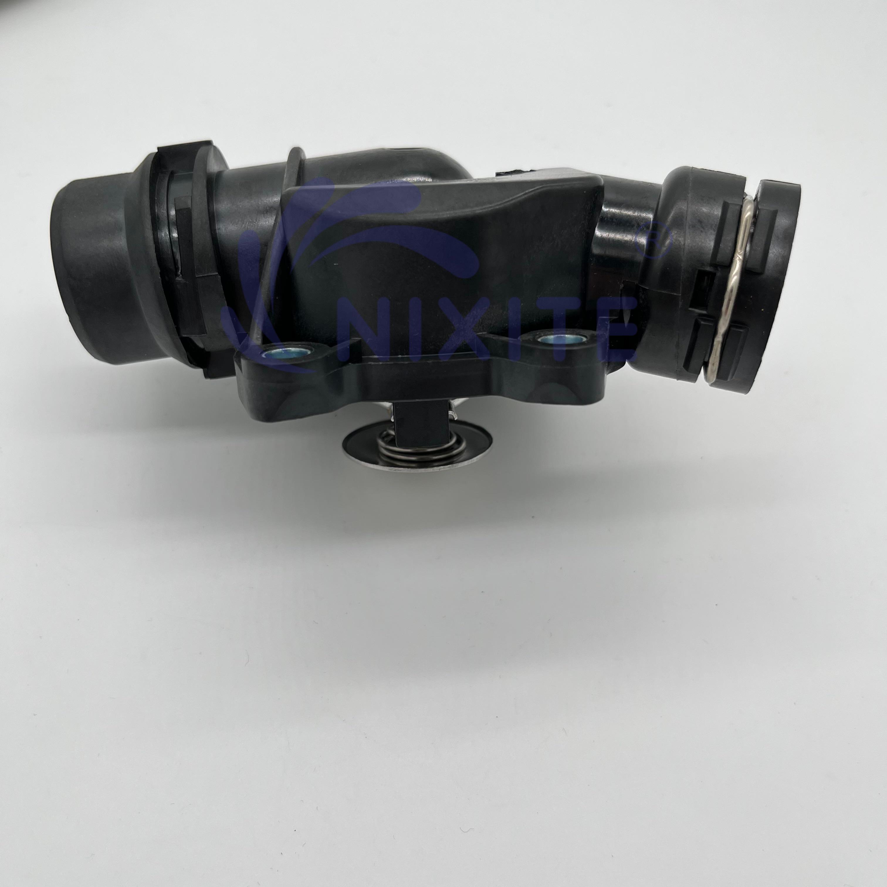 1151 2 354 056, 11512354056, 1338139 Engine Coolant Thermostat Housing Assembly