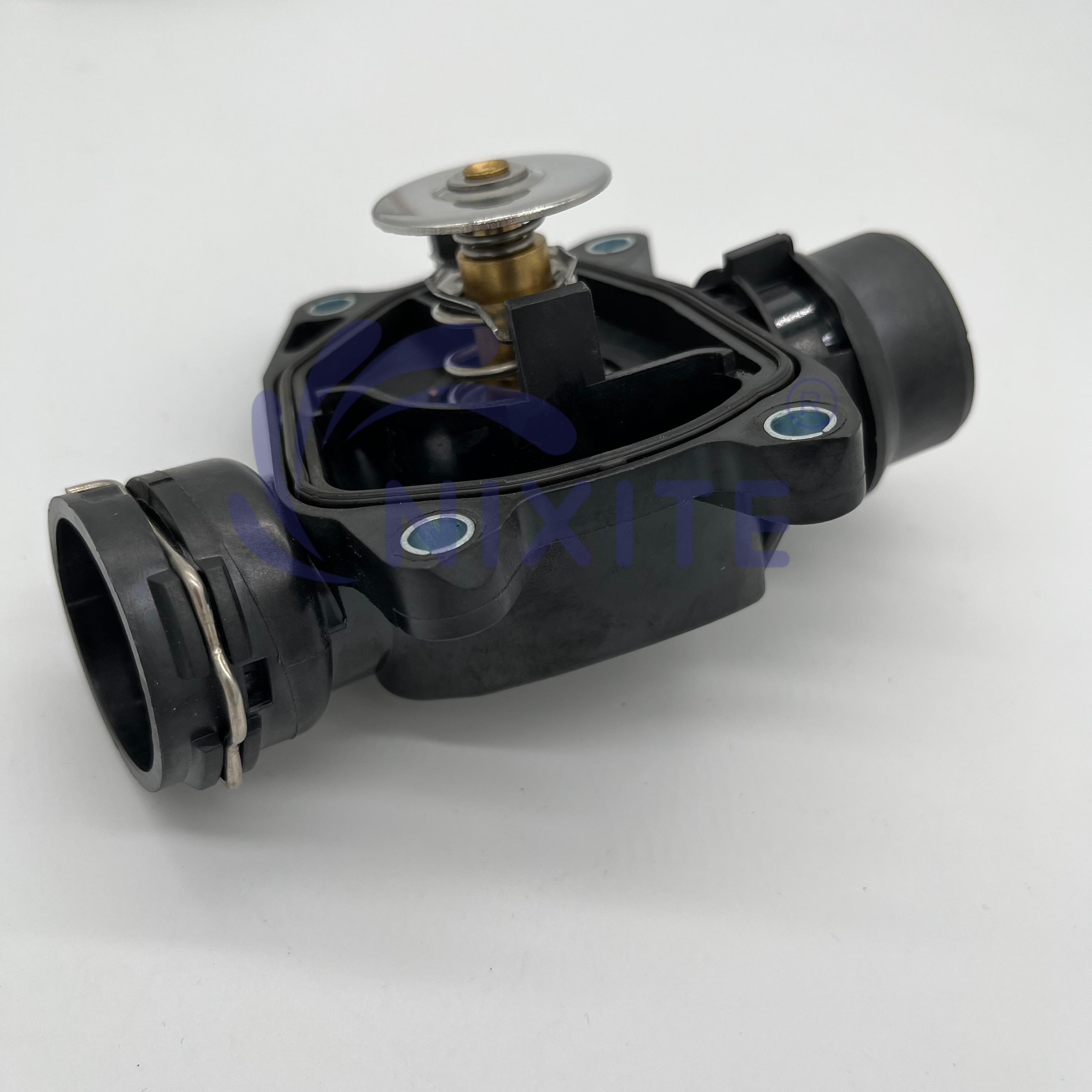 1151 2 354 056, 11512354056, 1338139 Engine Coolant Thermostat Housing Assembly