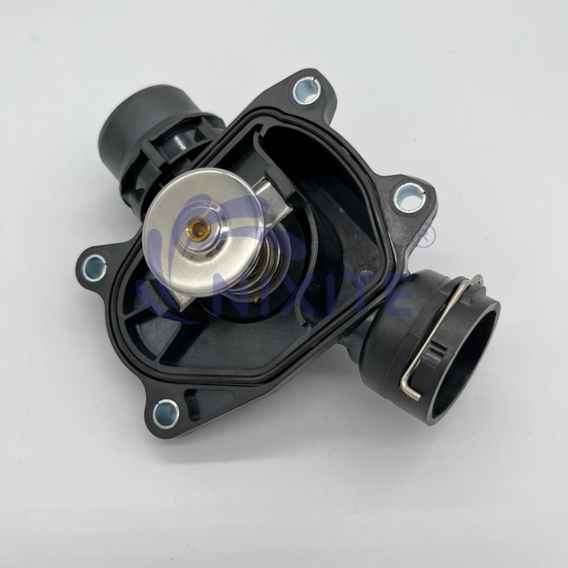 1151 2 354 056, 11512354056, 1338139 Engine Coolant Thermostat Housing Assembly