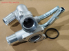 CA2015170A, 7T4E8594BB, 9U3E-8A587-AA Engine Coolant Thermostat Housing Assembly